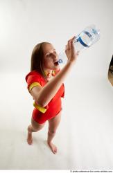 MARTINA BAYWATCH STANDING POSE WITH BOTTLE
